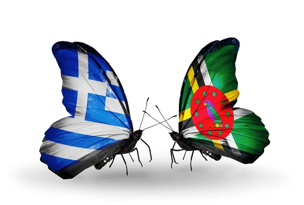 Fjärilar med flaggor av Grekland och dominica — Stockfoto