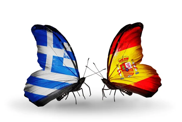 Motýli s vlajkami, Řecka a Španělska — Stock fotografie