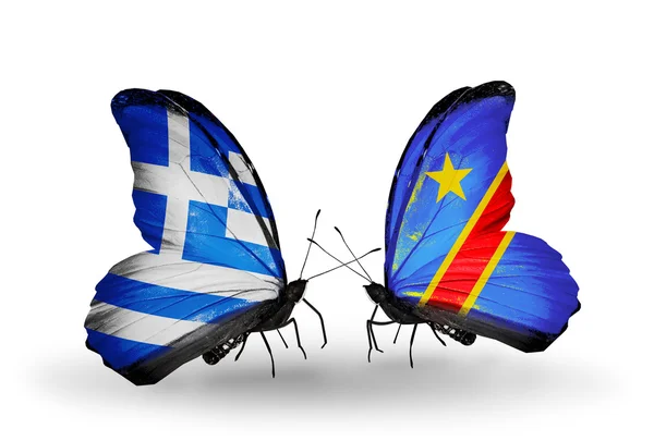 Dva motýli s vlajkami vztahů, Řecko a kongo — Stock fotografie