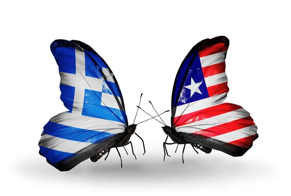 Dos mariposas con banderas de relaciones Grecia y Liberia —  Fotos de Stock