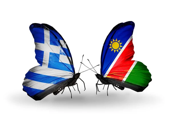 Dos mariposas con banderas de relaciones Grecia y Namibia — Foto de Stock