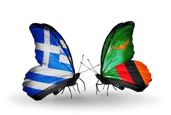 Dos mariposas con banderas de relaciones Grecia y Zambia — Foto de Stock