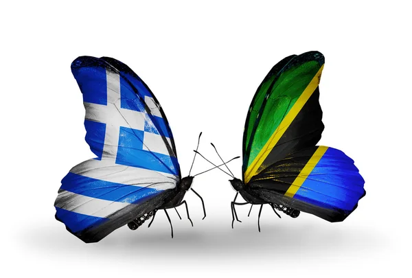 Due farfalle con bandiere di relazioni Grecia e Tanzania — Foto Stock
