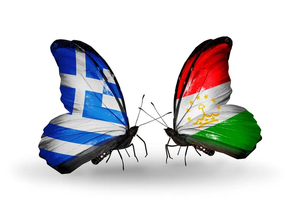 Two butterflies with flags of relations  Greece and Tajikistan — Stock Photo, Image