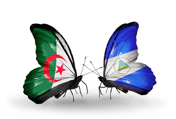 Iki ilişkileri bayrakları ile Cezayir ve Nikaragua kelebekler — Stok fotoğraf