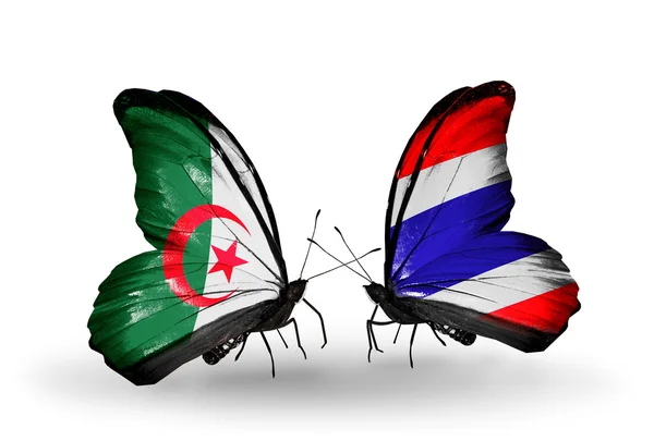 Due farfalle con bandiere di relazioni Algeria e Thailandia — Foto Stock