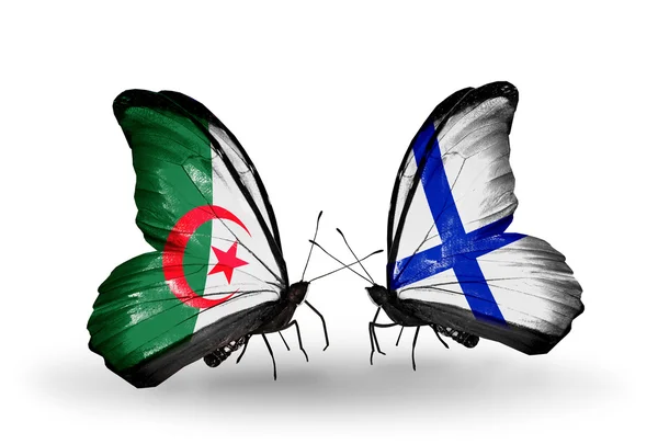 Twee vlinders met vlaggen van de betrekkingen, Algerije en finland — Stockfoto