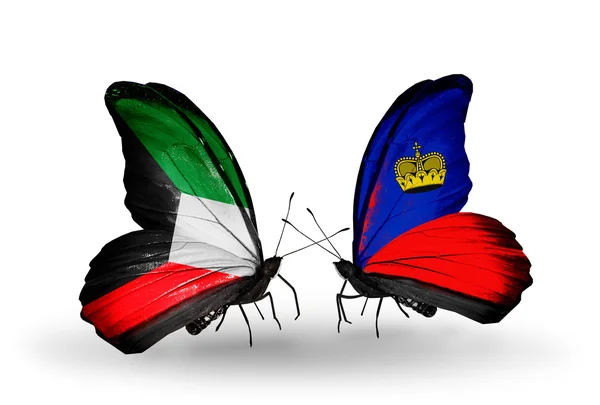 Две бабочки с флагами отношений Кувейта и Лихтенштейна — стоковое фото