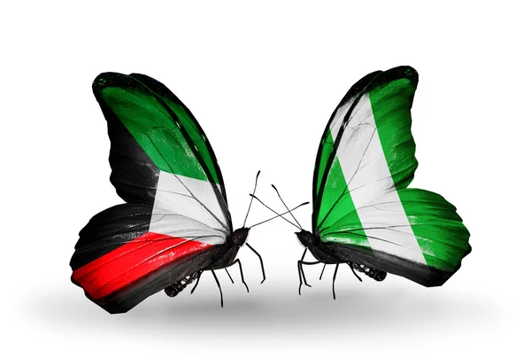 Two butterflies with flags of relations  Kuwait and Nigeria — Stock Photo, Image