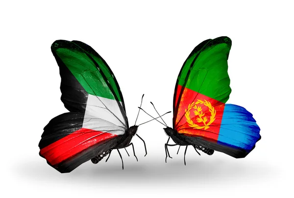Dva motýli s vlajkami vztahů, Kuvajtu a eritrea — Stock fotografie