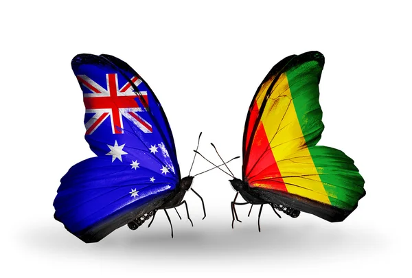 Dwa motyle z flagami stosunki Australii i Gwinei — Zdjęcie stockowe