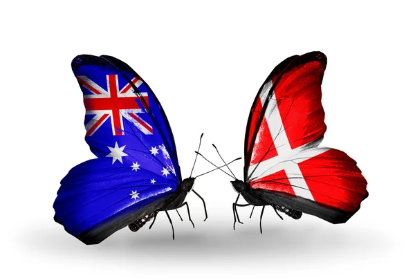 Dva motýli s vlajkami vztahů, Austrálie a Dánsko — Stock fotografie