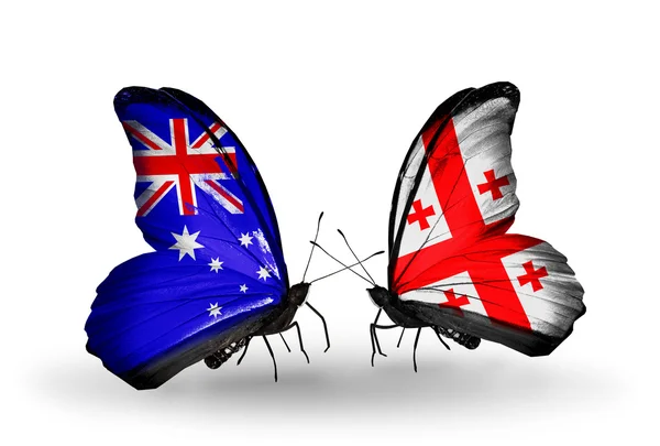 Dva motýli s vlajkami vztahů, Austrálie a Gruzie — Stock fotografie