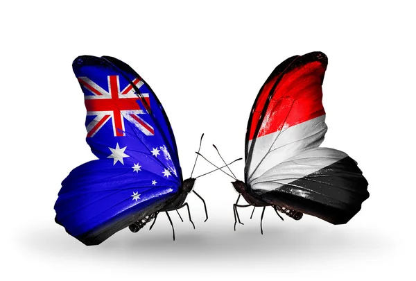 Kaksi perhosia lippujen suhteet Australiaan ja Jemeniin — kuvapankkivalokuva