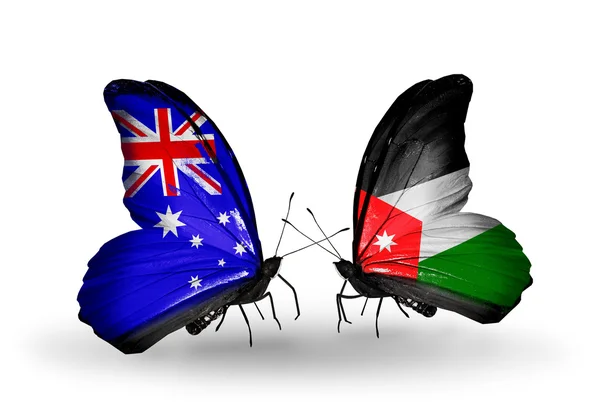 Dva motýli s vlajkami vztahů, Austrálie a Jordánska — Stock fotografie