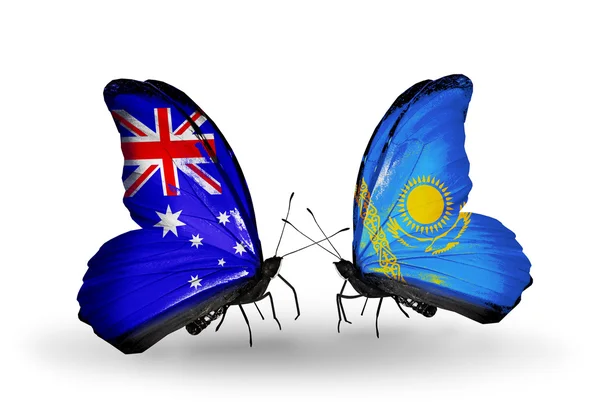 Dos mariposas con banderas de relaciones Australia y Kazajstán — Foto de Stock