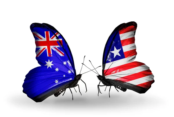 Dos mariposas con banderas de relaciones Australia y Liberia —  Fotos de Stock