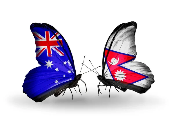 Zwei schmetterlinge mit fahnen der beziehungen australien und nepal — Stockfoto