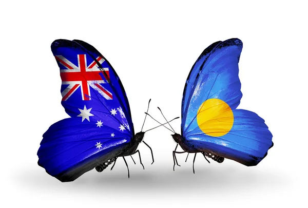 Dos mariposas con banderas de relaciones Australia y Palaos — Foto de Stock