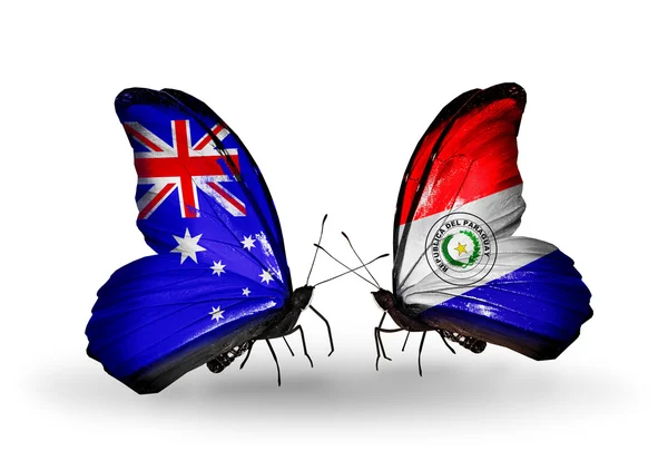 Deux papillons avec des drapeaux de relations Australie et Paraguay — Photo