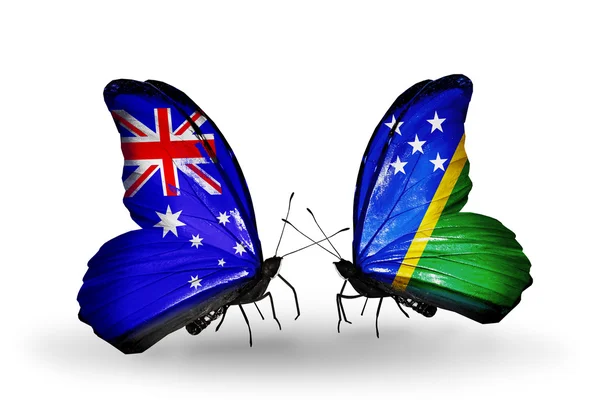 Twee vlinders met vlaggen van betrekkingen Australië en solomon eilanden — Stockfoto