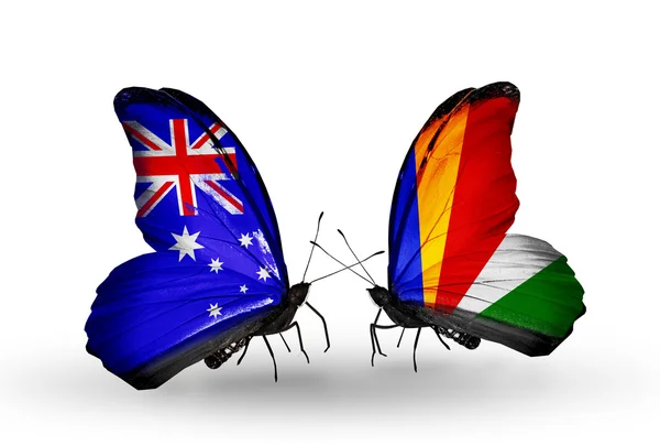 Dos mariposas con banderas de relaciones Australia y Seychelles — Foto de Stock