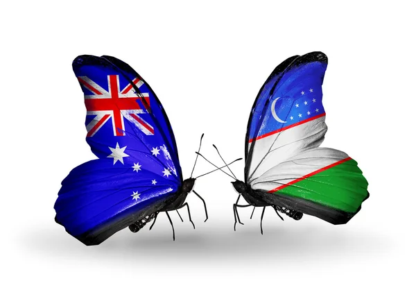 Två fjärilar med flaggor av förbindelserna mellan Australien och uzbekistan — Stockfoto