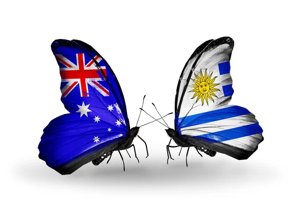 Due farfalle con bandiere di relazioni Australia e Uruguay — Foto Stock