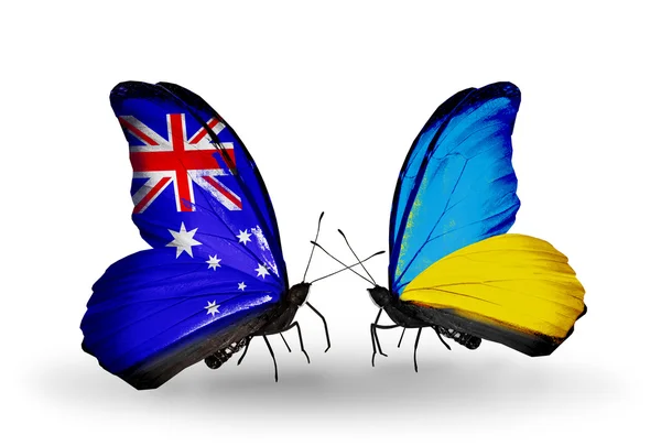 Zwei Schmetterlinge mit Fahnen der Beziehungen Australien und Ukraine — Stockfoto