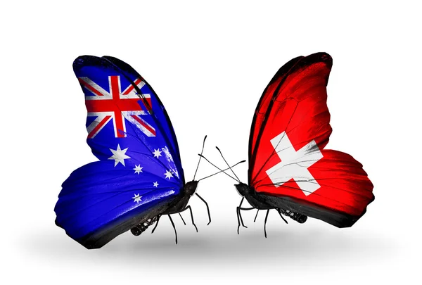 Dwa motyle z flagami stosunków australia i Szwajcaria — Zdjęcie stockowe