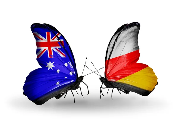 Twee vlinders met vlaggen betrekkingen Australië en Zuid-Ossetië — Stockfoto
