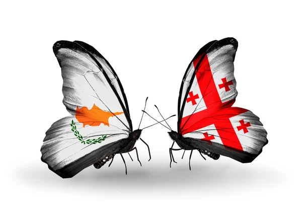 Two butterflies with flags of relations Cyprus and Georgia — Stock Photo, Image