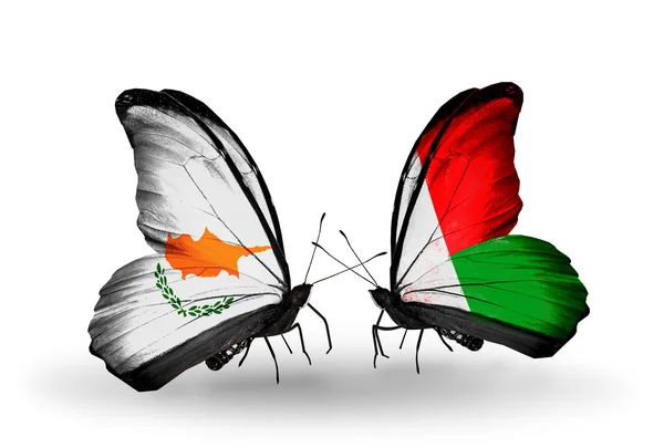 Two butterflies with flags of relations Cyprus and Madagascar — ストック写真