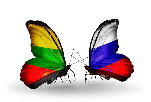 Motýli s vlajkami Litvy a Ruska — Stock fotografie