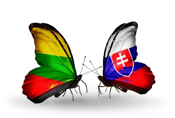 Farfalle con bandiere di Lituania e Slovacchia — Foto Stock