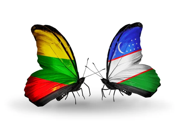 Butterflies with flags of Lithuania and Uzbekistan — Stock Photo, Image