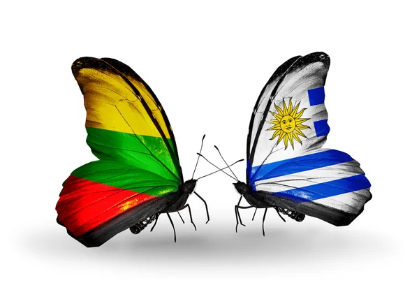Fjärilar med flaggor i Litauen och uruguay — Stockfoto