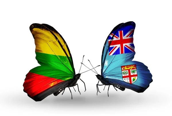 Farfalle con bandiere della Lituania e delle Figi — Foto Stock