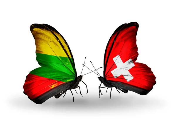 Butterflies with flags of Lithuania and Switzerland — Stock Photo, Image