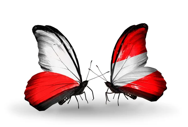 Butterflies with flags of Poland and Austria — Stock Photo, Image