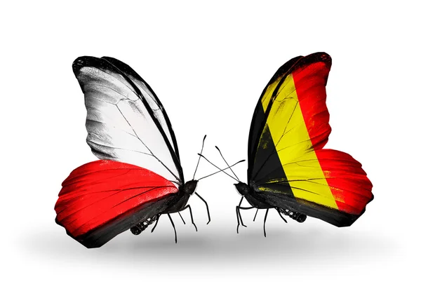 Farfalle con bandiere di Polonia e Belgio — Foto Stock