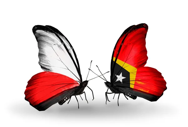 Borboletas com bandeiras da Polônia e Timor-Leste — Fotografia de Stock
