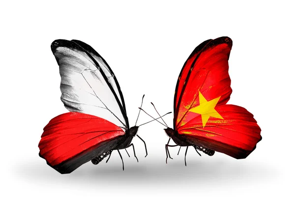 Papillons avec des drapeaux de la Pologne et du Vietnam — Photo
