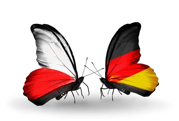 Mariposas con banderas de Polonia y Alemania — Foto de Stock