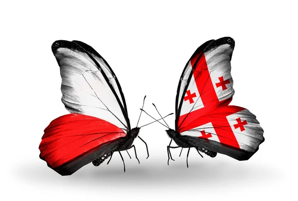 Butterflies with flags of Poland and Georgia — Stock Photo, Image