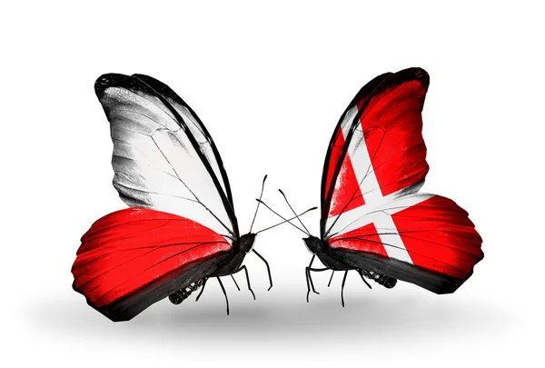 Butterflies with flags of Poland and Denmark — Stock Photo, Image