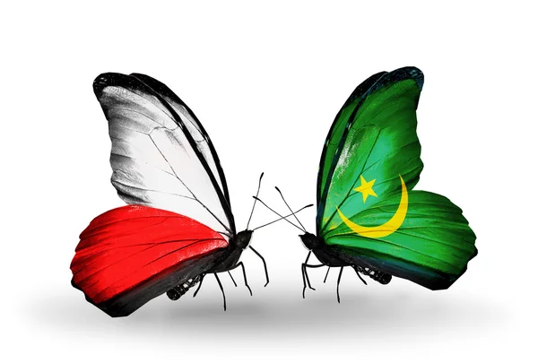 Dos mariposas con banderas de Polonia y Mauritania — Foto de Stock