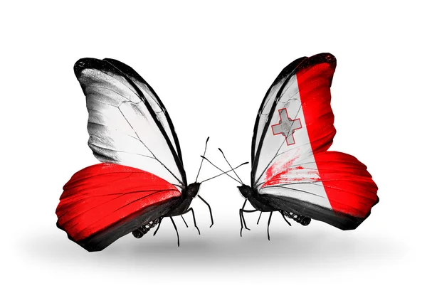 Dos mariposas con banderas de Polonia y Malta — Foto de Stock