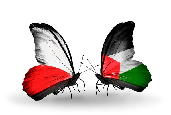 ポーランドとパレスチナの旗を 2 匹の蝶 — ストック写真