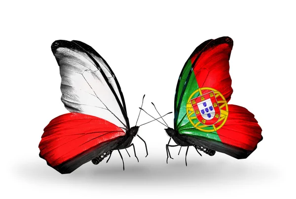 Duas borboletas com bandeiras da Polónia e de Portugal — Fotografia de Stock